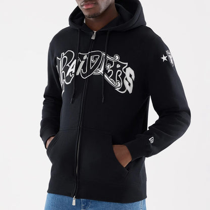 The model is wearing this MLB Word Art Las Vegas Raiders 2 Way Full Zip Hoodie in black. 3