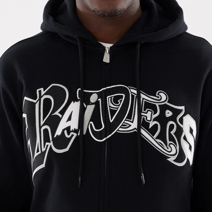 The model is wearing this MLB Word Art Las Vegas Raiders 2 Way Full Zip Hoodie in black. 4