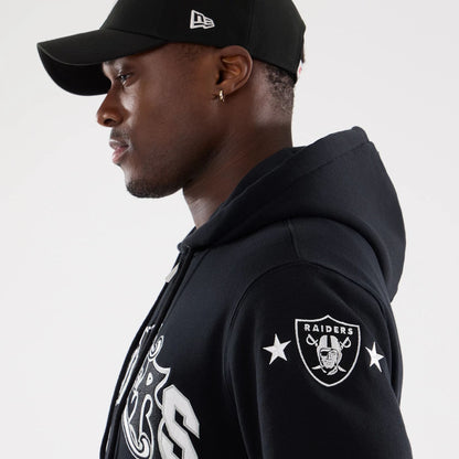 The model is wearing this MLB Word Art Las Vegas Raiders 2 Way Full Zip Hoodie in black. 7