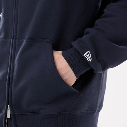 The model is wearing this MLB Comfort New York Yankees 2 Way Full Zip Hoodie in navy. 5