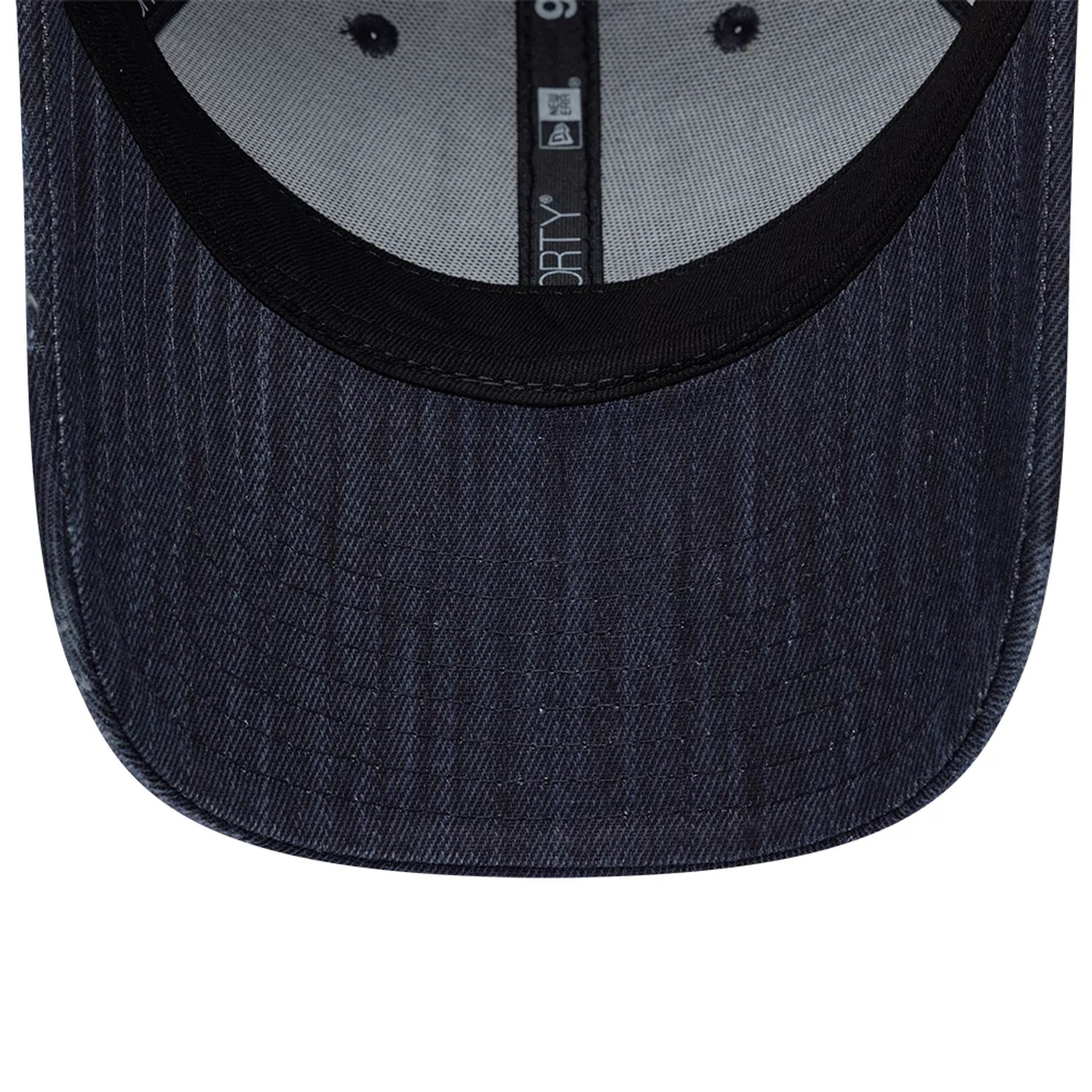 Pictured is this New Era Street Archived 9FORTY cap in navy. 7