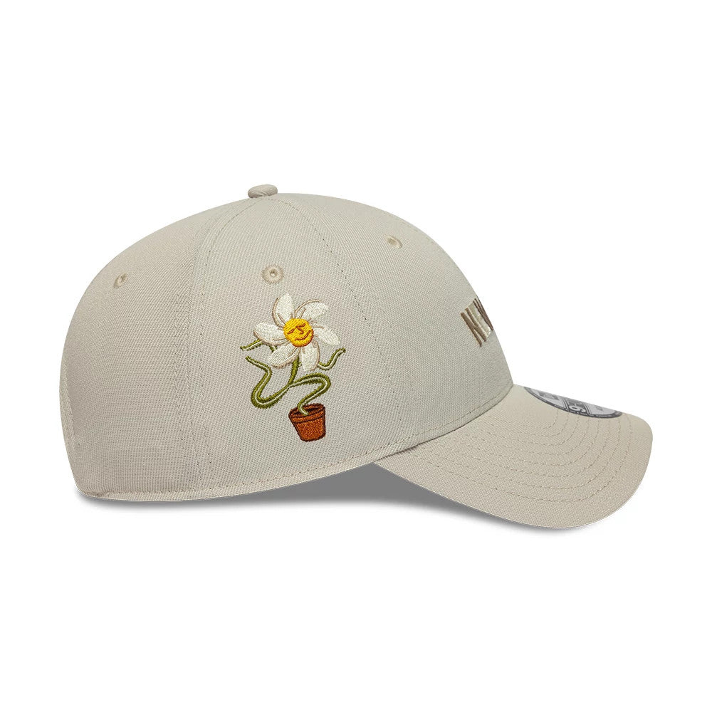 Pictured is this New Era Earth Day 9FORTY Adjustable cap in beige. 4