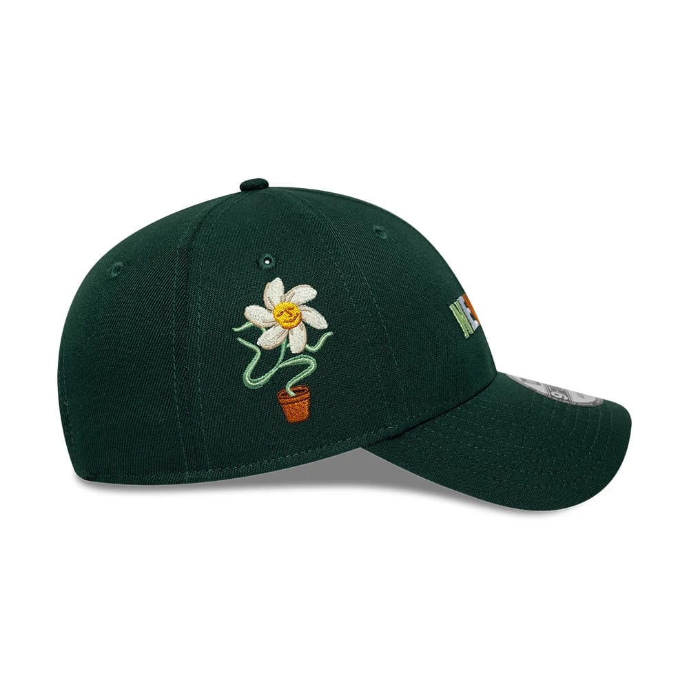 Pictured is this New Era Earth Day 9FORTY Adjustable cap in dark green. 4