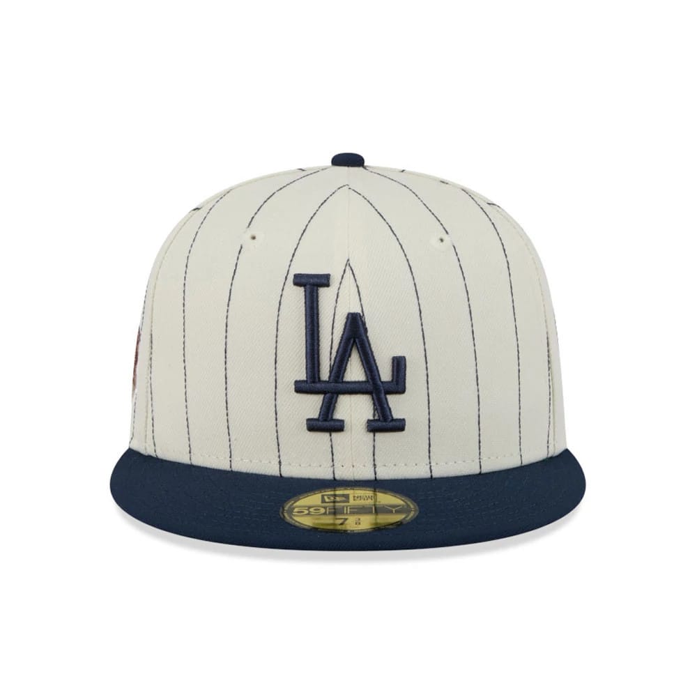 Pictured is this MLB Stripes LA Dodgers 59FIFTY Fitted cap in cream. 3