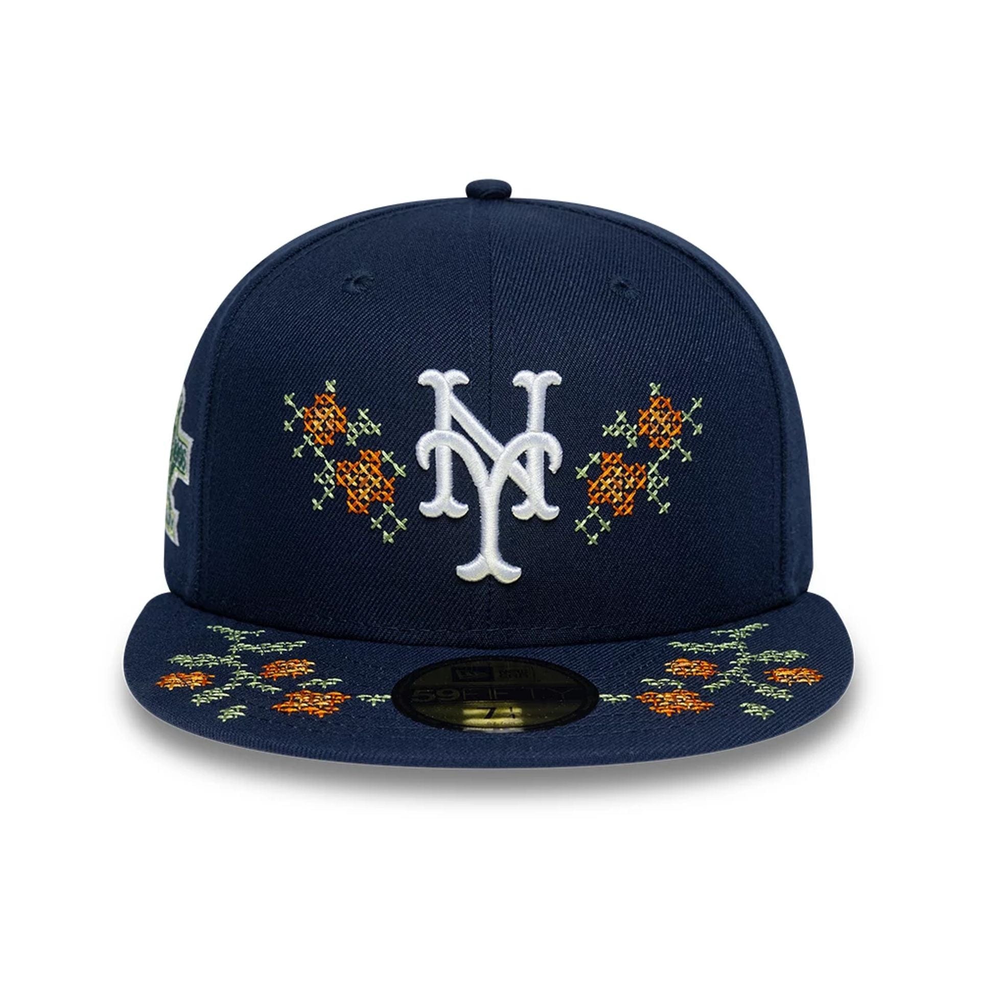 Pictured is this MLB Garden New York Mets 59FIFTY Fitted cap in dark blue. 2