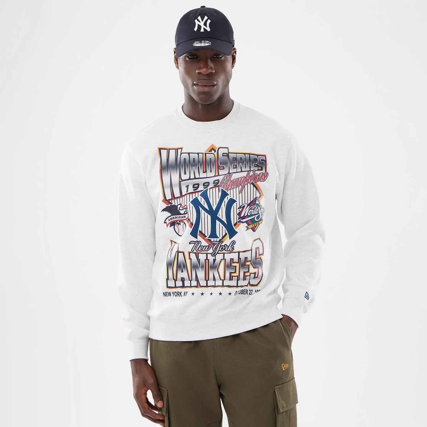 The model is wearing this MLB Retro New York Yankees Oversized Crew Neck Sweater in White 1