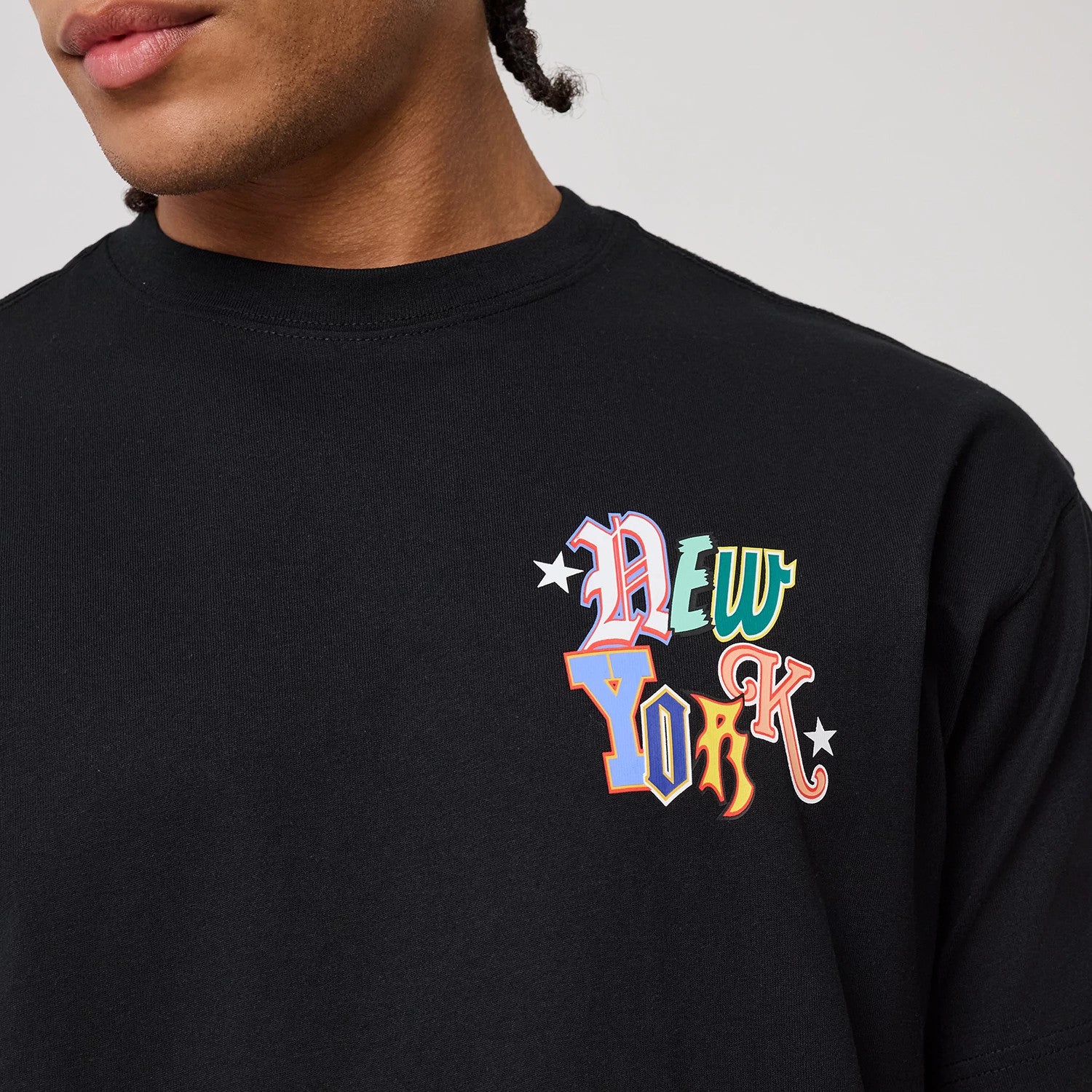 The model is wearing this MLB Word Art New York Yankees T-Shirt in black. 3