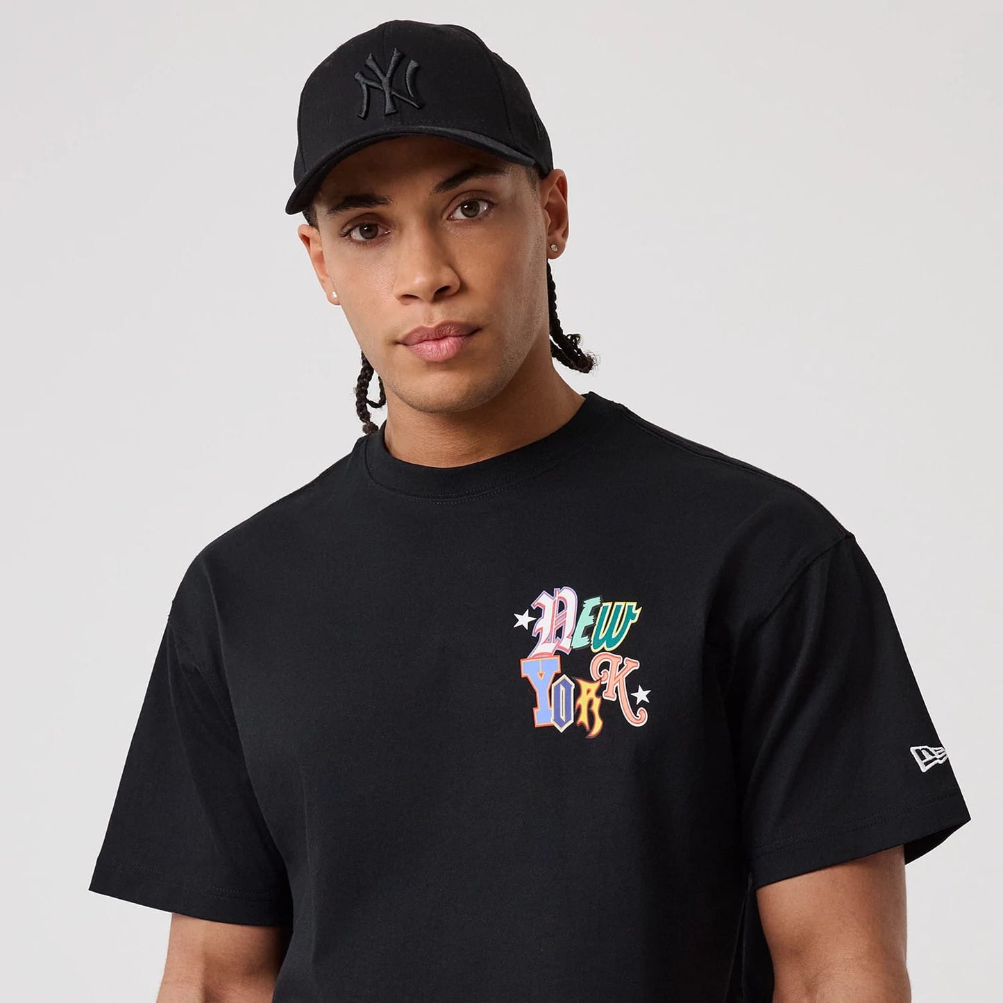 The model is wearing this MLB Word Art New York Yankees T-Shirt in black. 5