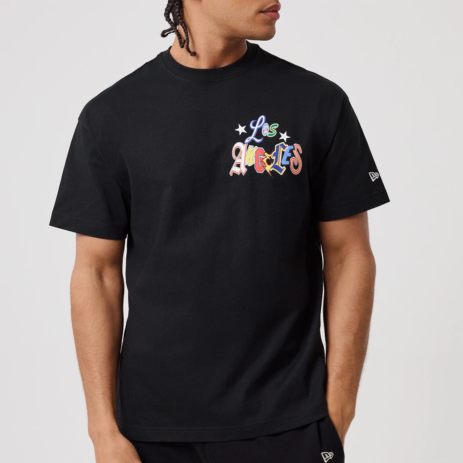 The model is wearing this MLB Word Art LA Dodgers T-Shirt in black. 3
