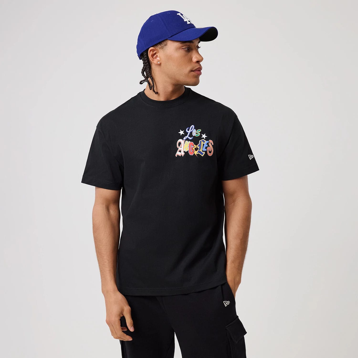 The model is wearing this MLB Word Art LA Dodgers T-Shirt in black. 1