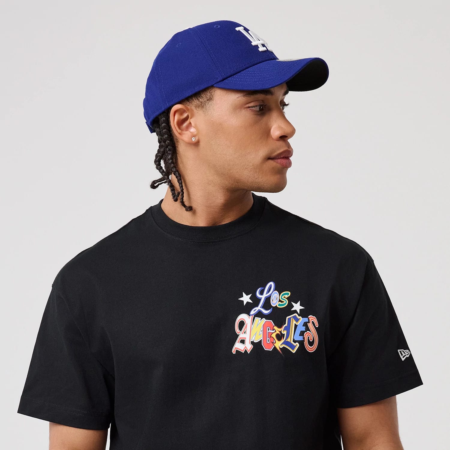The model is wearing this MLB Word Art LA Dodgers T-Shirt in black. 6
