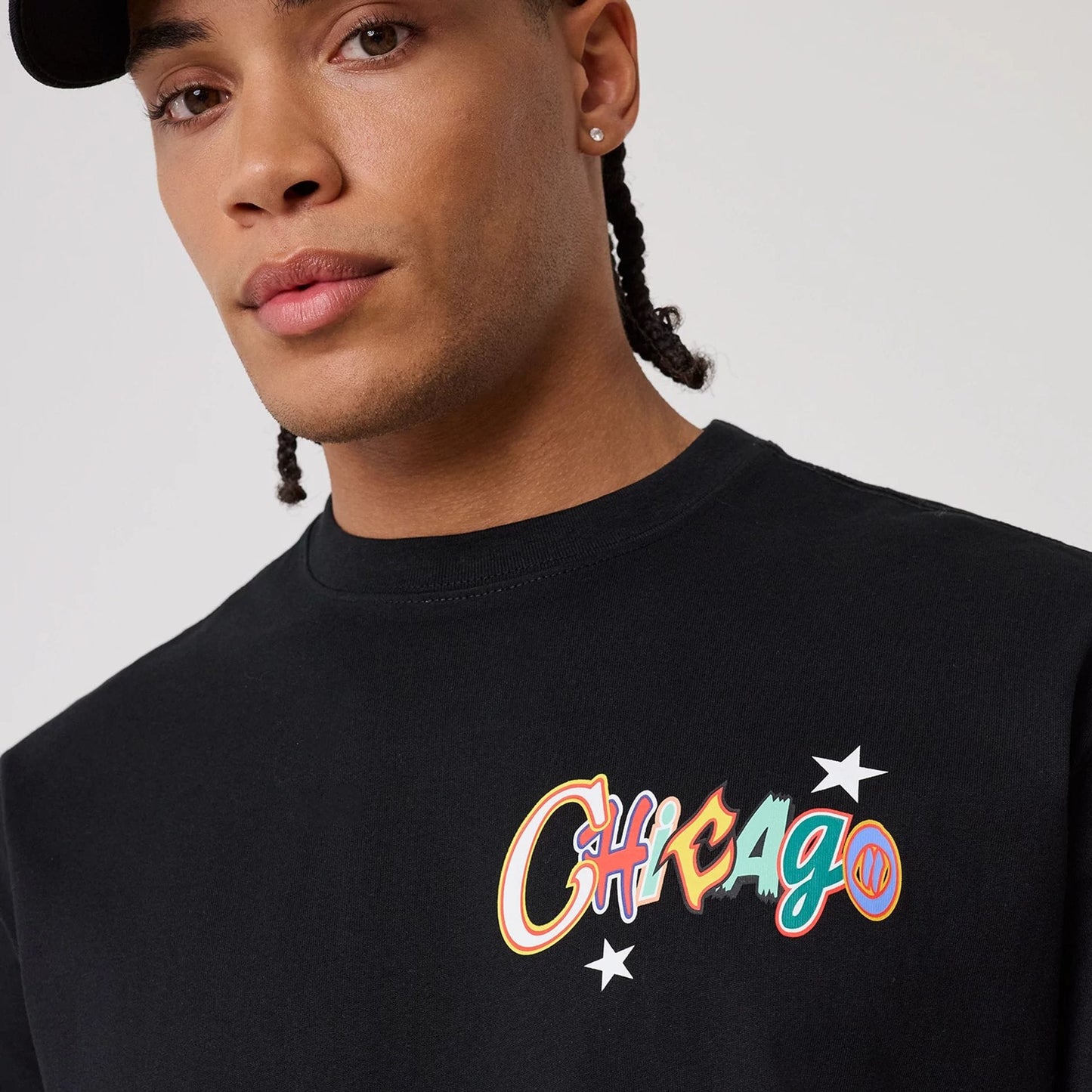The model is wearing this MLB Word Art Chicago Bulls T-Shirt in black. 5