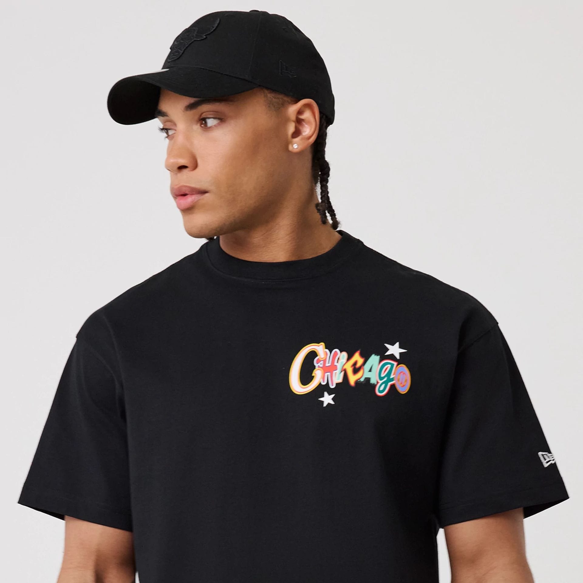 The model is wearing this MLB Word Art Chicago Bulls T-Shirt in black. 7