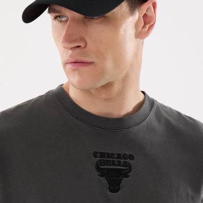 The model is wearing this NBA Shadow Pop Chicago Bulls T-Shirt in black. 4