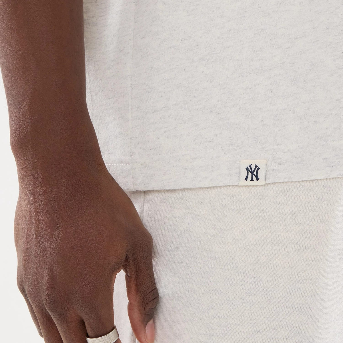 The model is wearing this MLB Comfort New York Yankees T-Shirt in grey. 5
