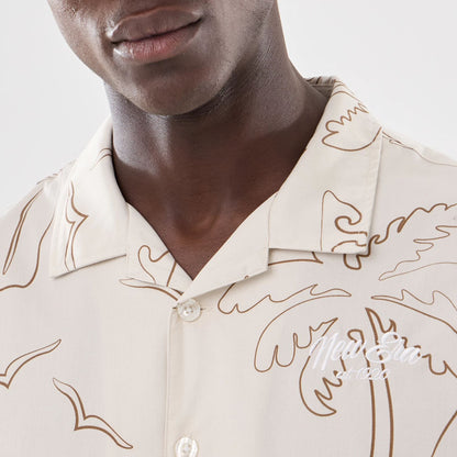 The model is wearing this New Era Resort Short Sleeve Shirt in natural. 3
