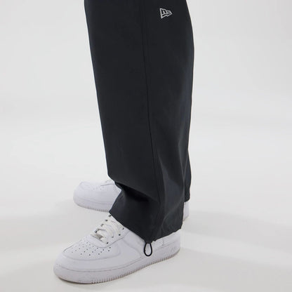 The model is wearing this New Era Urban Core Straight Leg Joggers in black. 5