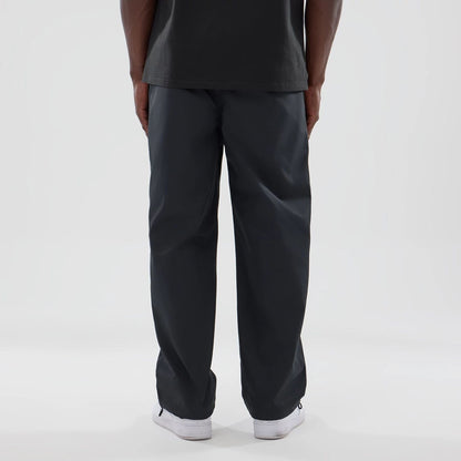 The model is wearing this New Era Urban Core Straight Leg Joggers in black. 2