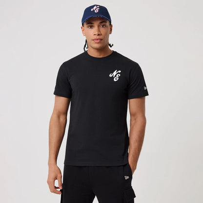 The model is wearing this New Era Sakura T-Shirt in black. 1