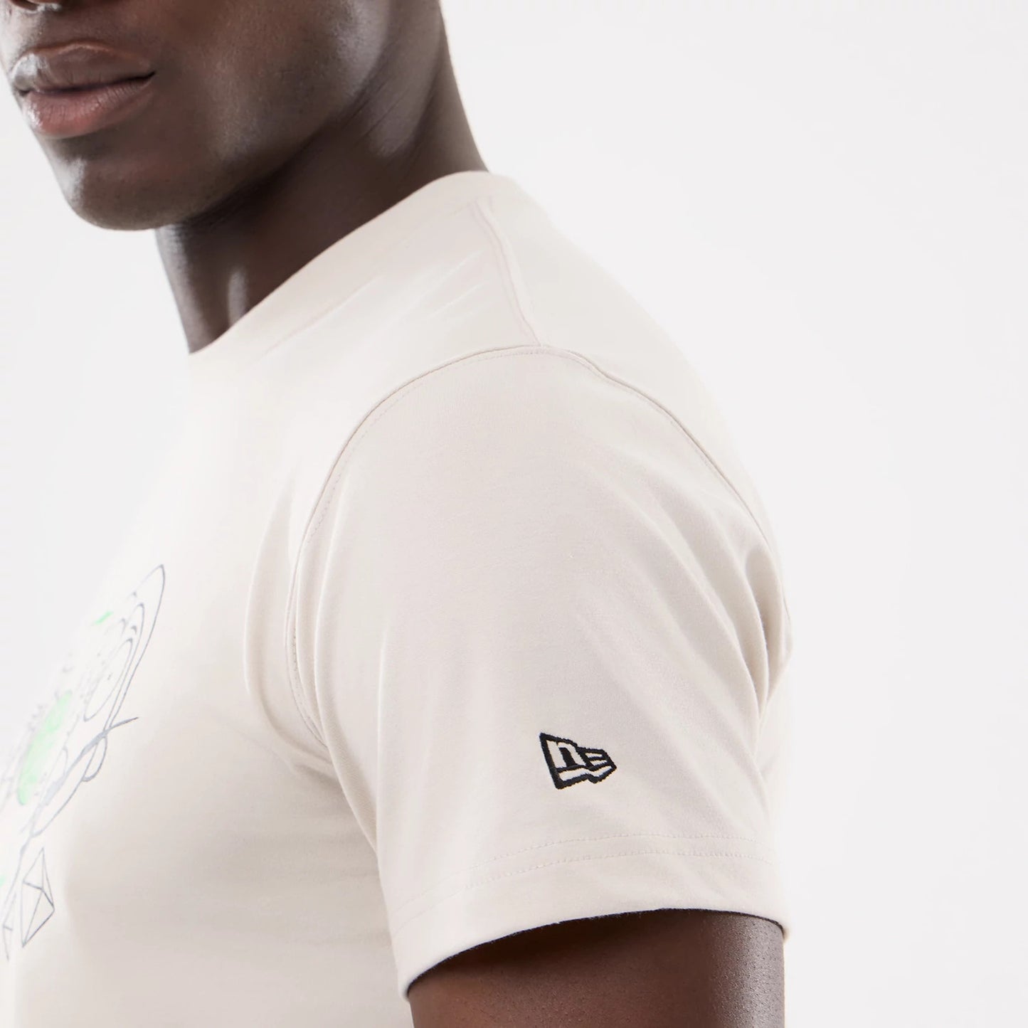 The model is wearing this Rick And Morty Character Stack T-Shirt in cream. 5