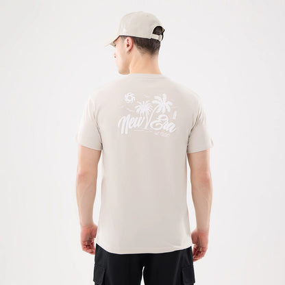 The model is wearing this New Era Resort T-Shirt in natural. 2