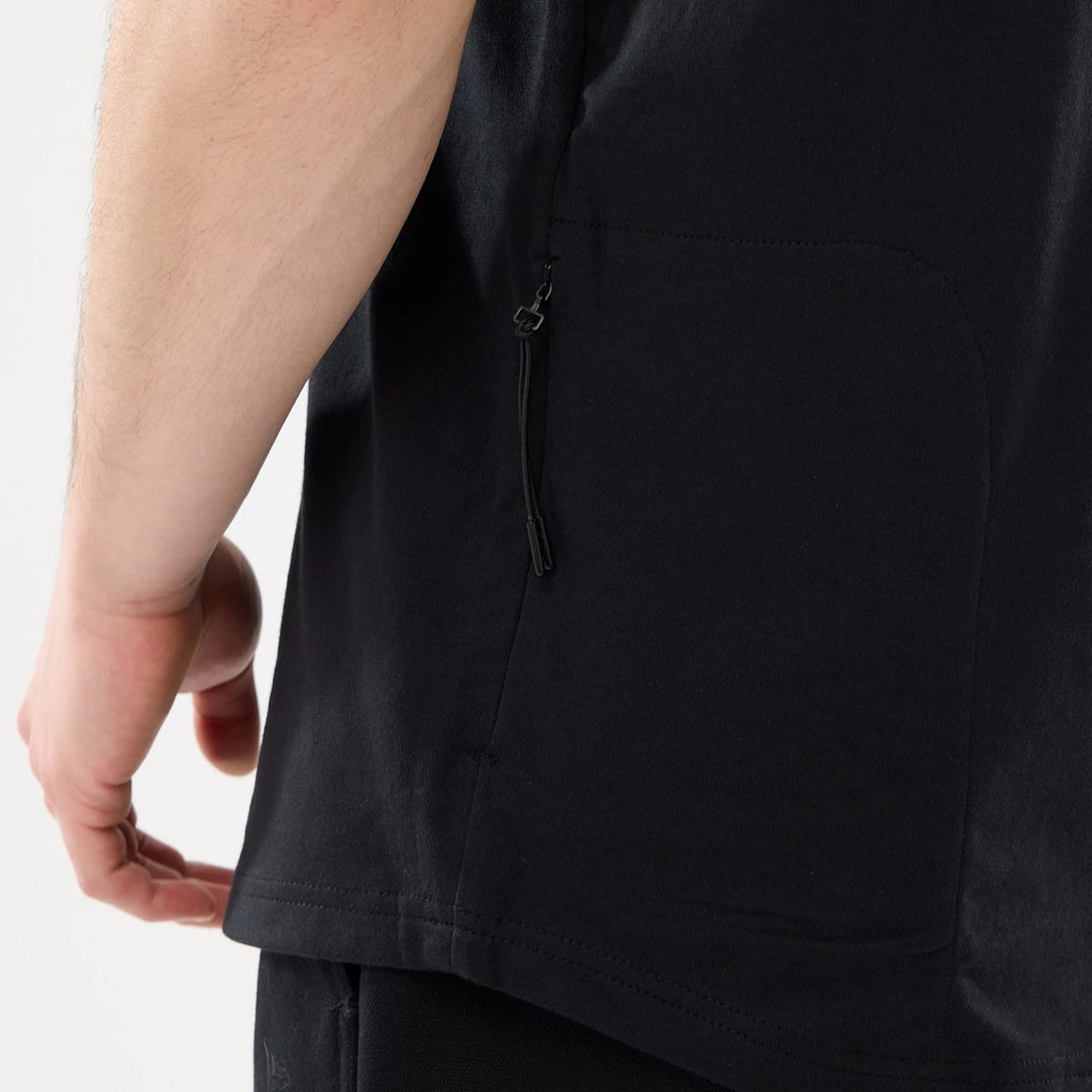 The model is wearing this New Era Outdoor Mountain T-Shirt in black. 7