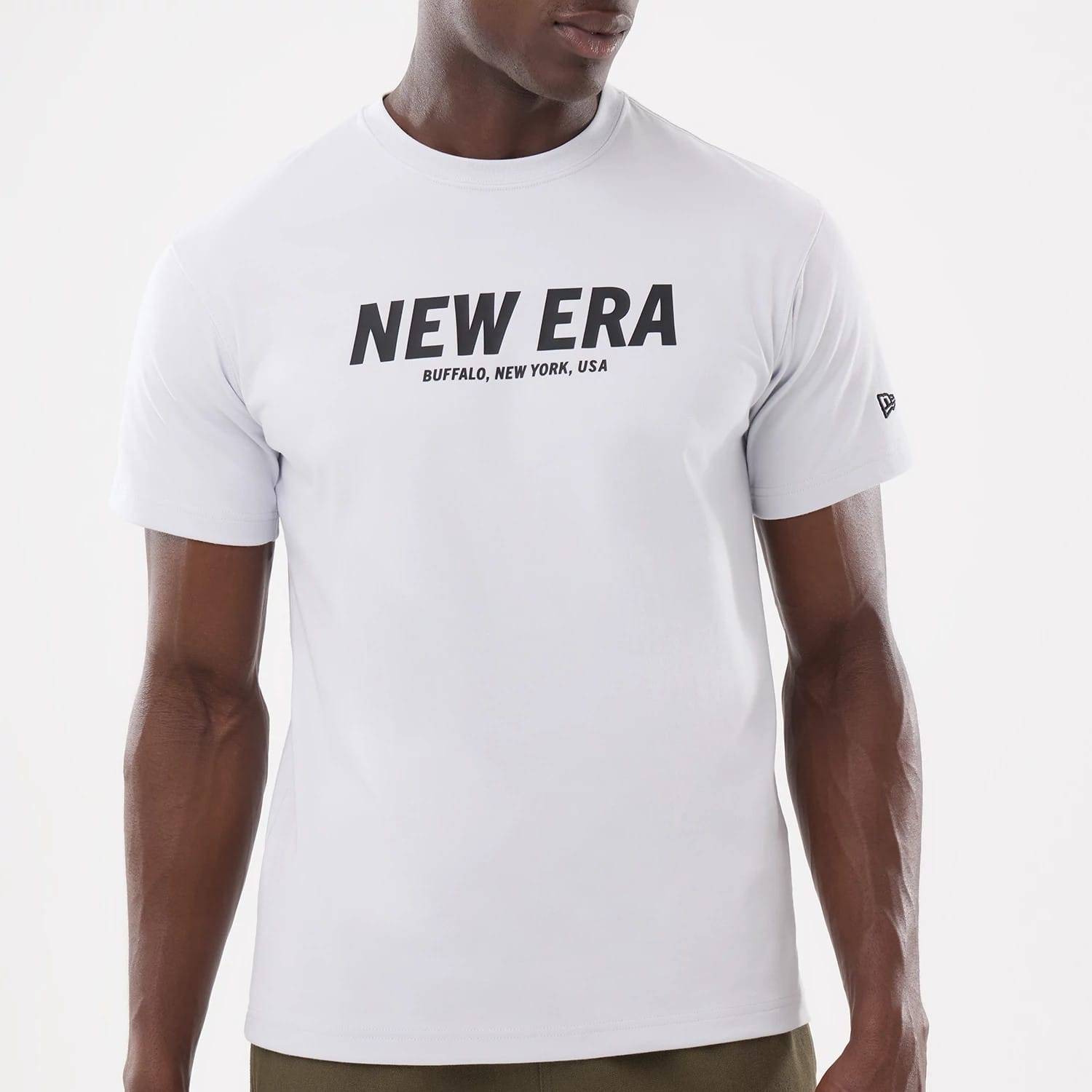 The model is wearing this New Era Basic T-Shirt in white. 5