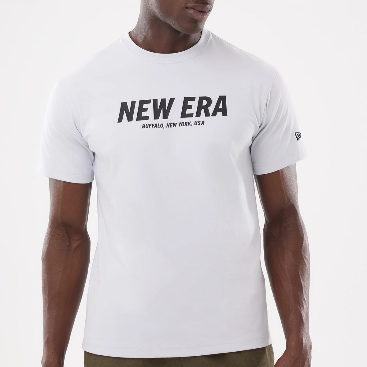 The model is wearing this New Era Basic T-Shirt in white. 5