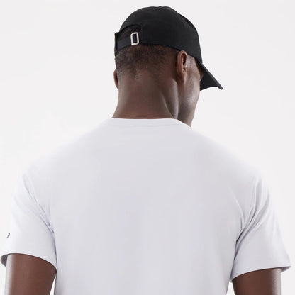 The model is wearing this New Era Basic T-Shirt in white. 7