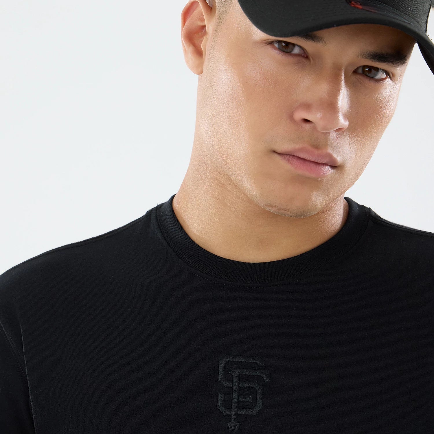 The model is wearing this MLB Cartoon San Francisco Giants T-Shirt in black. 5
