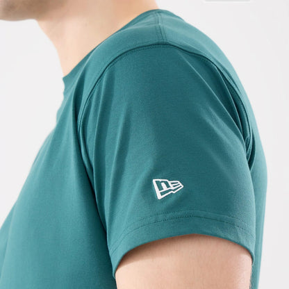 The model is wearing this New Era Earth Day T-Shirt in dark green. 4