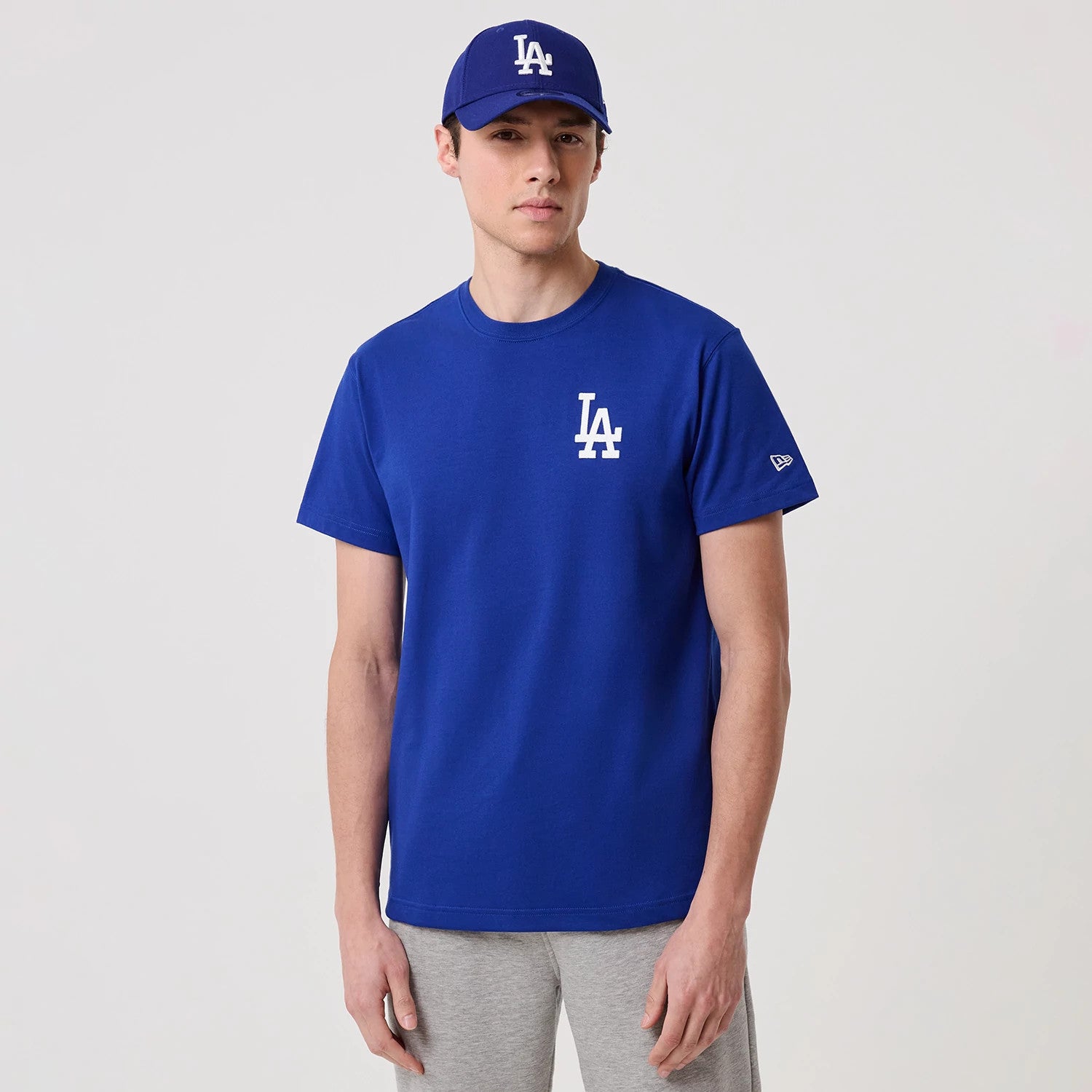 The model is wearing this MLB Banana Graphic LA Dodgers T-Shirt in bright blue. 1