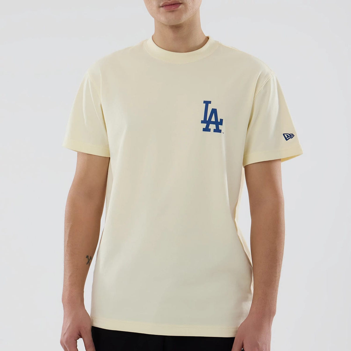The model is wearing this MLB City Series LA Dodgers T-Shirt in white. 4