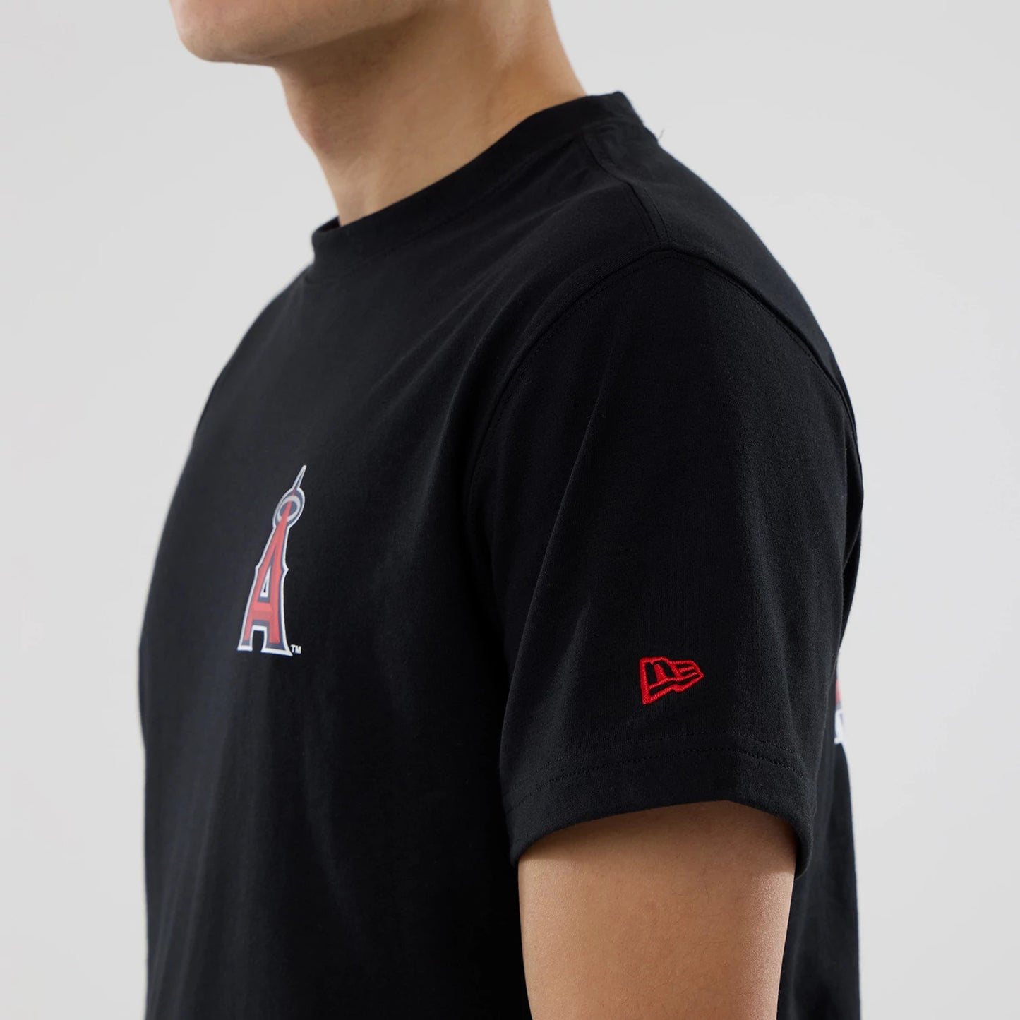 The model is wearing this MLB City Series LA Angels T-Shirt in black. 6