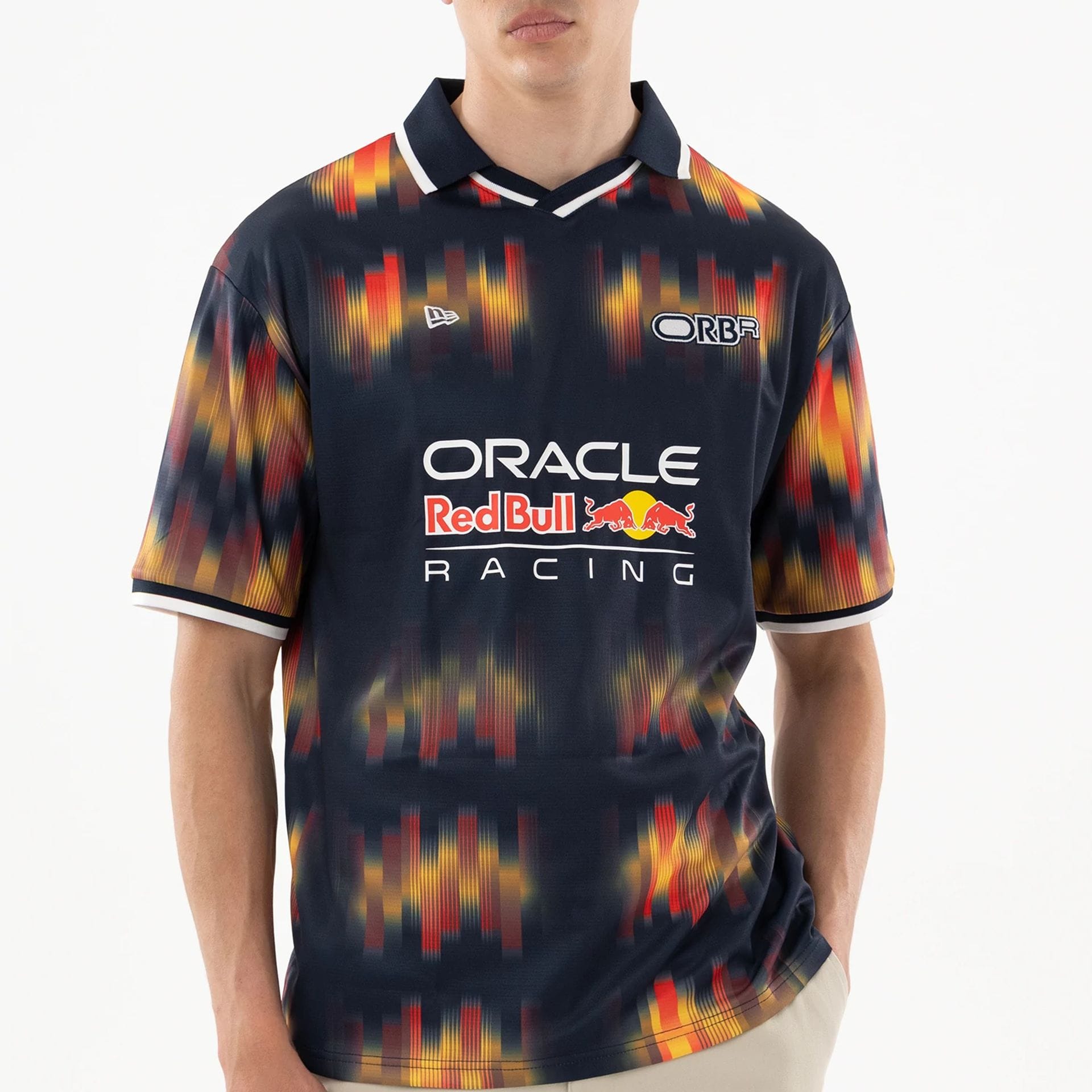 The model is wearing this Red Bull Racing Soccer Jersey in multi. 6