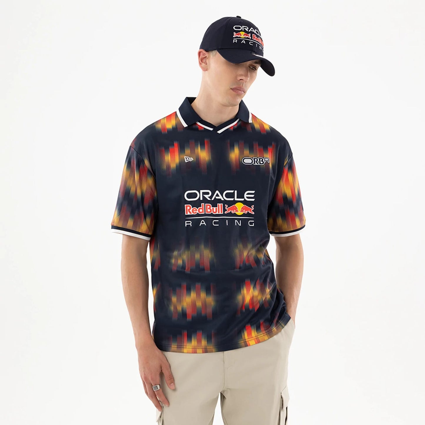 The model is wearing this Red Bull Racing Soccer Jersey in multi. 1