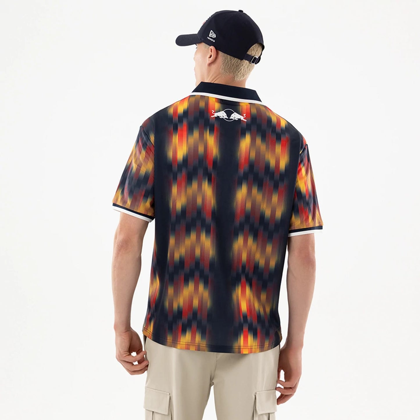 The model is wearing this Red Bull Racing Soccer Jersey in multi. 2