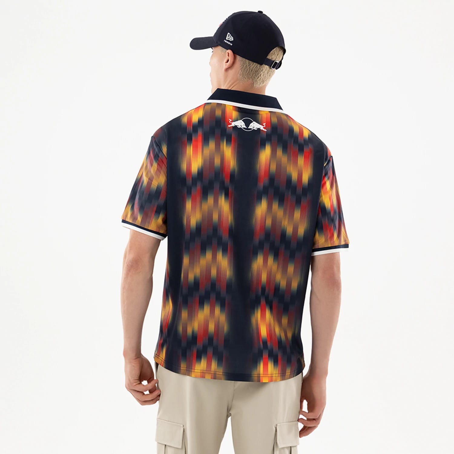 The model is wearing this Red Bull Racing Soccer Jersey in multi. 2
