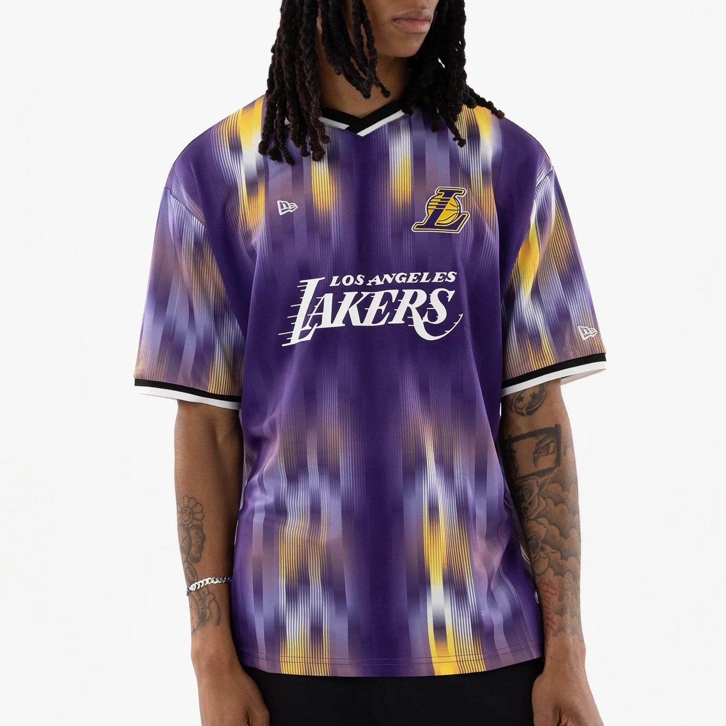 The model is wearing this NBA LA Lakers Soccer Jersey in purple. 3