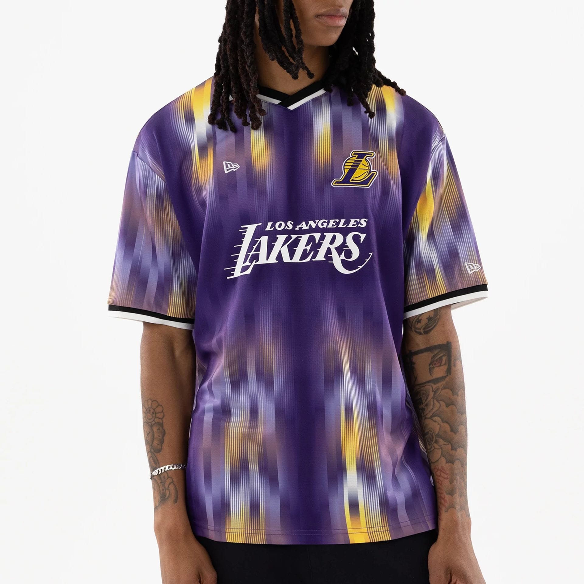 The model is wearing this NBA LA Lakers Soccer Jersey in purple. 3