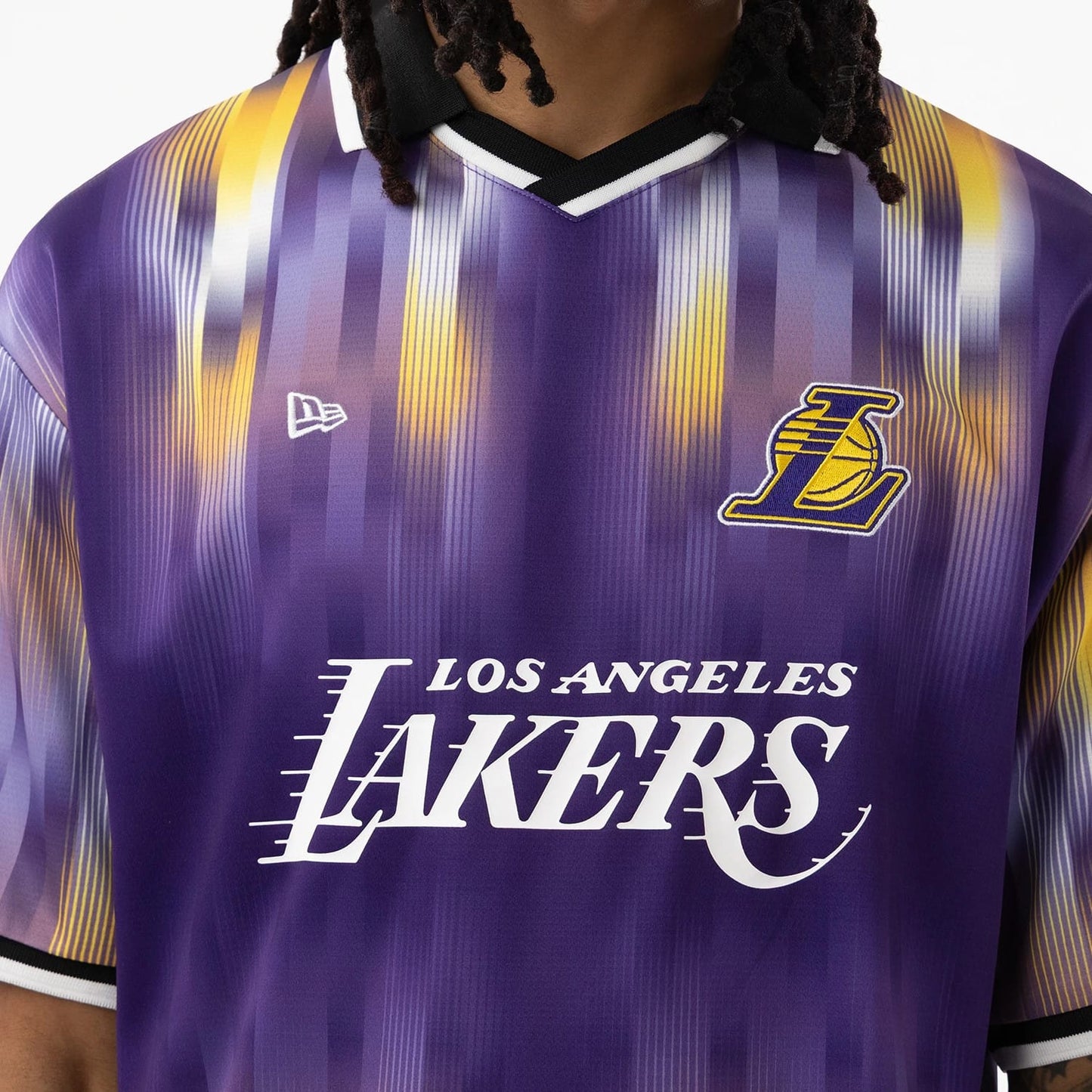 The model is wearing this NBA LA Lakers Soccer Jersey in purple. 4