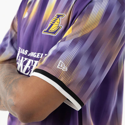 The model is wearing this NBA LA Lakers Soccer Jersey in purple. 5