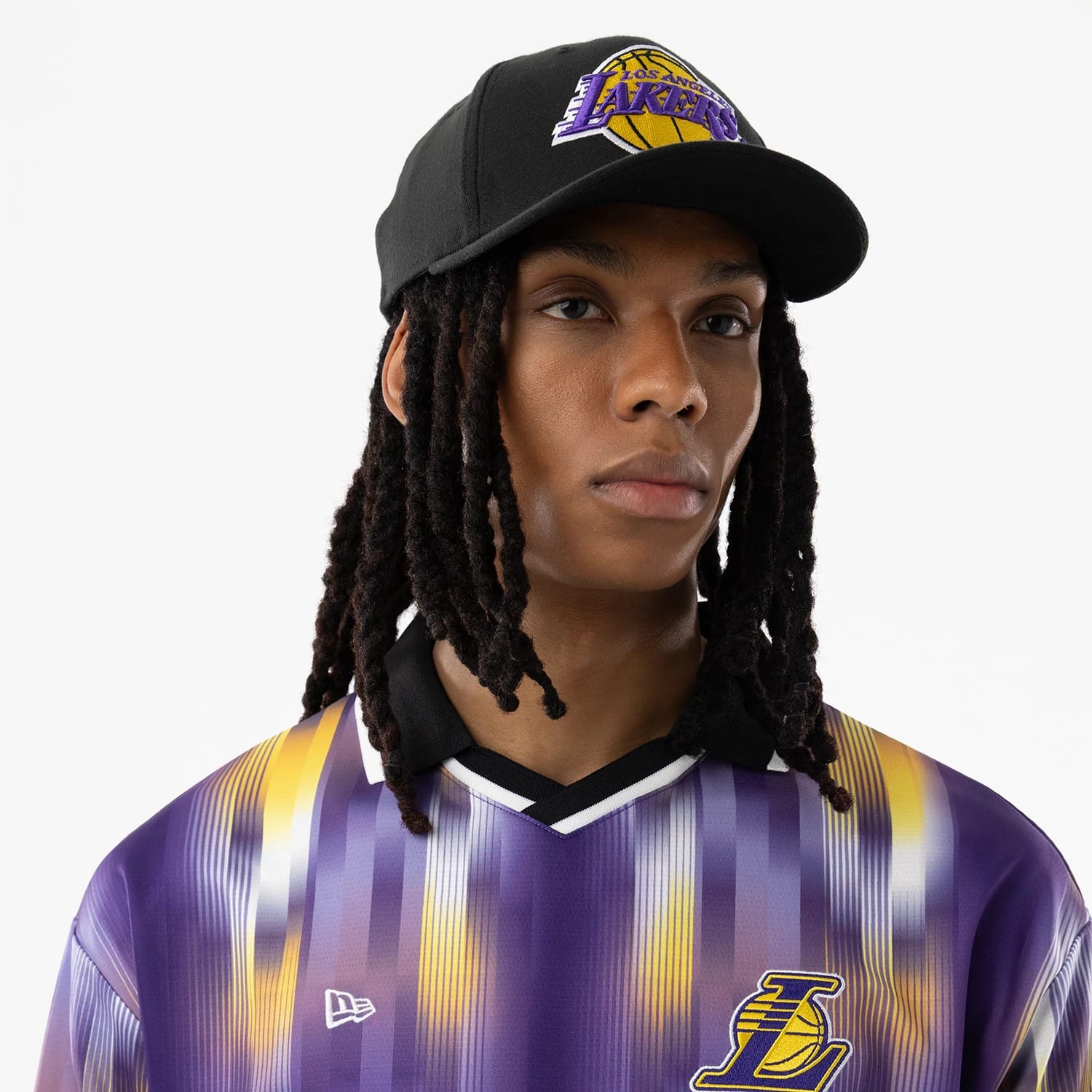 The model is wearing this NBA LA Lakers Soccer Jersey in purple. 6