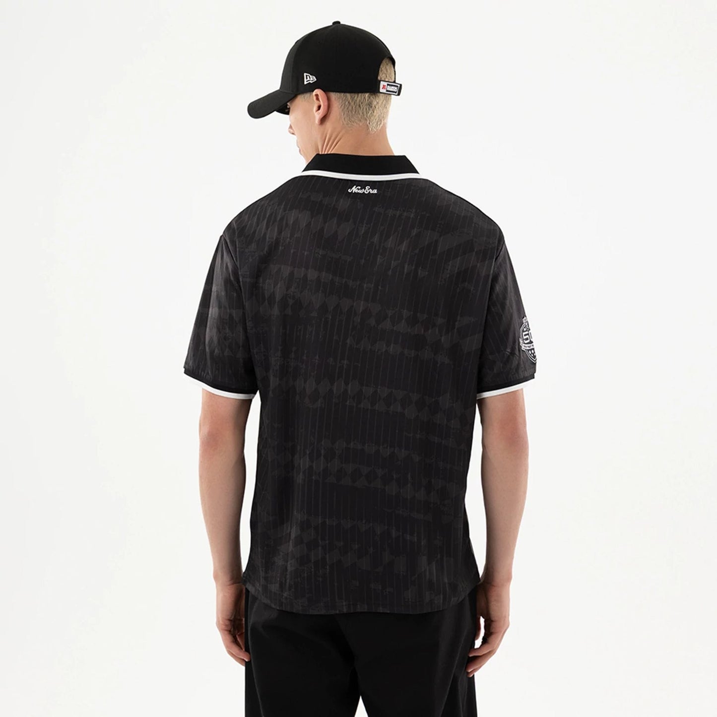 The model is wearing this NFL Las Vegas Raiders Soccer Jersey in black. 2