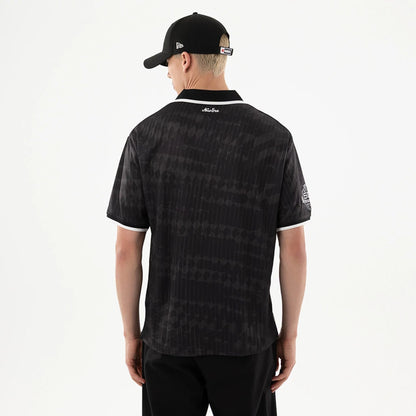 The model is wearing this NFL Las Vegas Raiders Soccer Jersey in black. 2