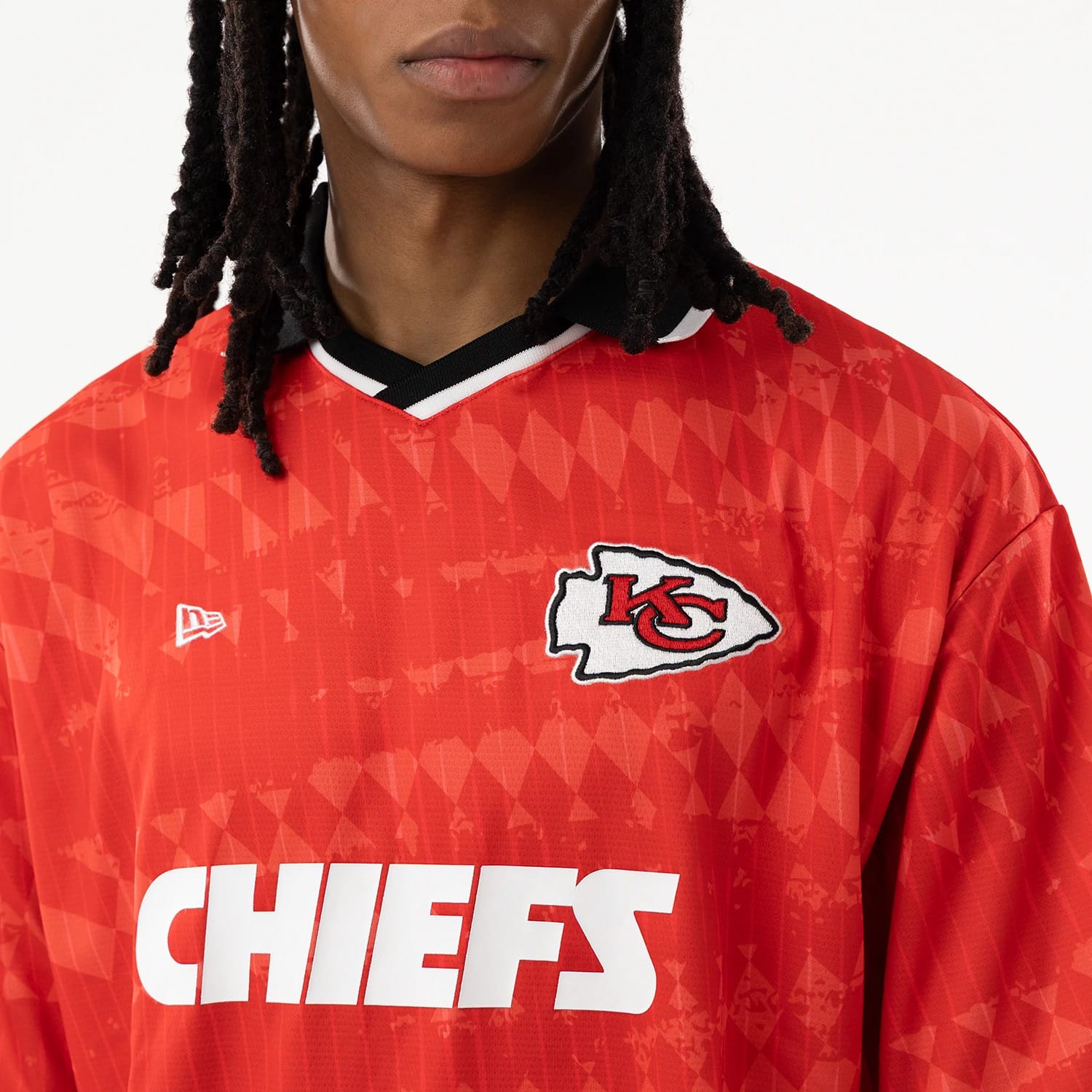 The model is wearing this NFL Kansas City Chiefs Soccer Jersey in red. 4