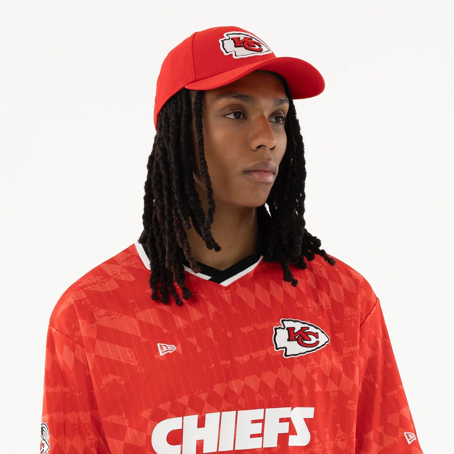The model is wearing this NFL Kansas City Chiefs Soccer Jersey in red. 6