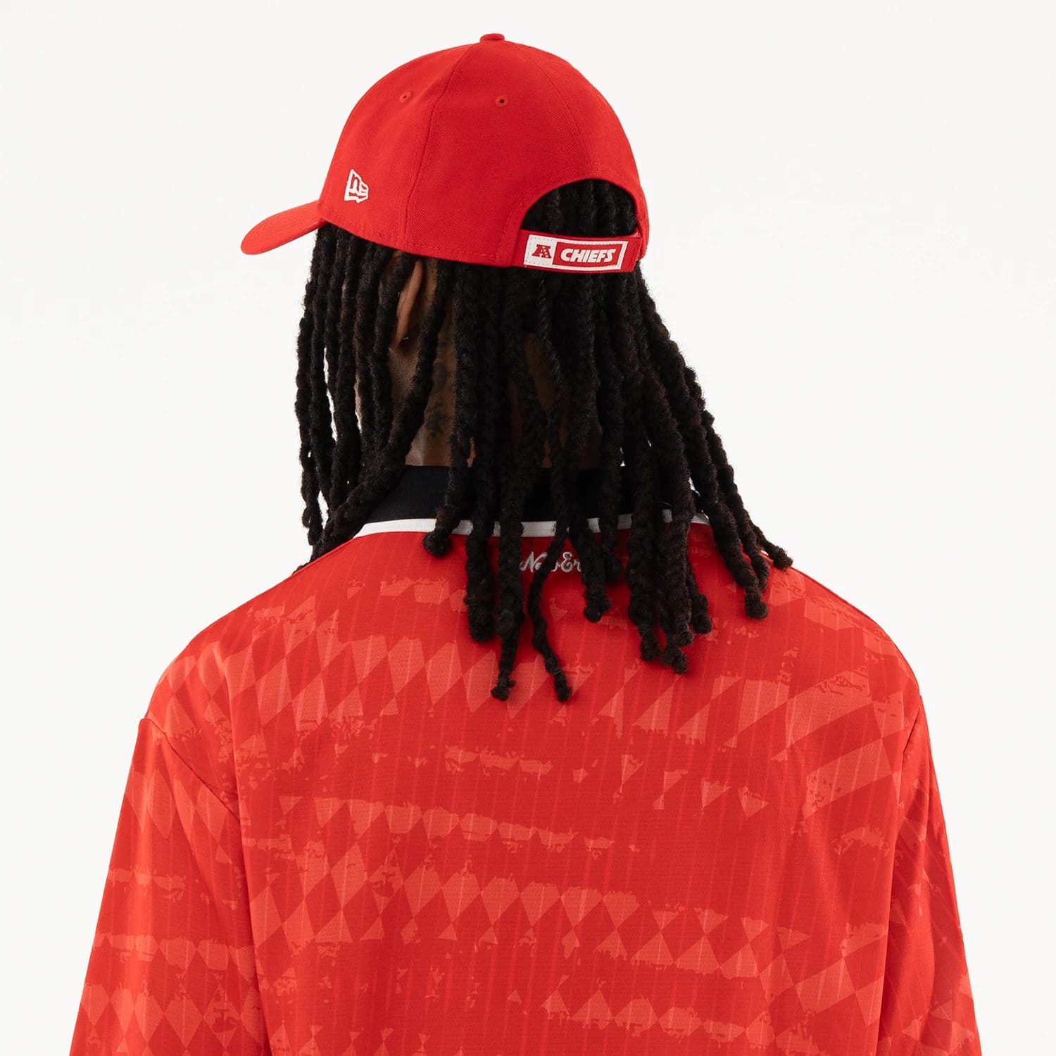 The model is wearing this NFL Kansas City Chiefs Soccer Jersey in red. 7