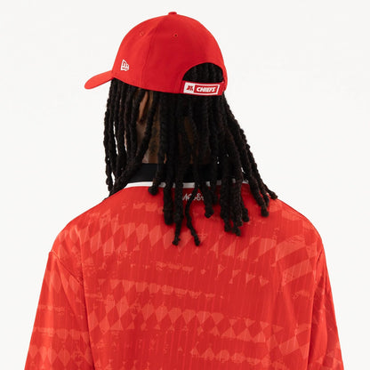 The model is wearing this NFL Kansas City Chiefs Soccer Jersey in red. 7