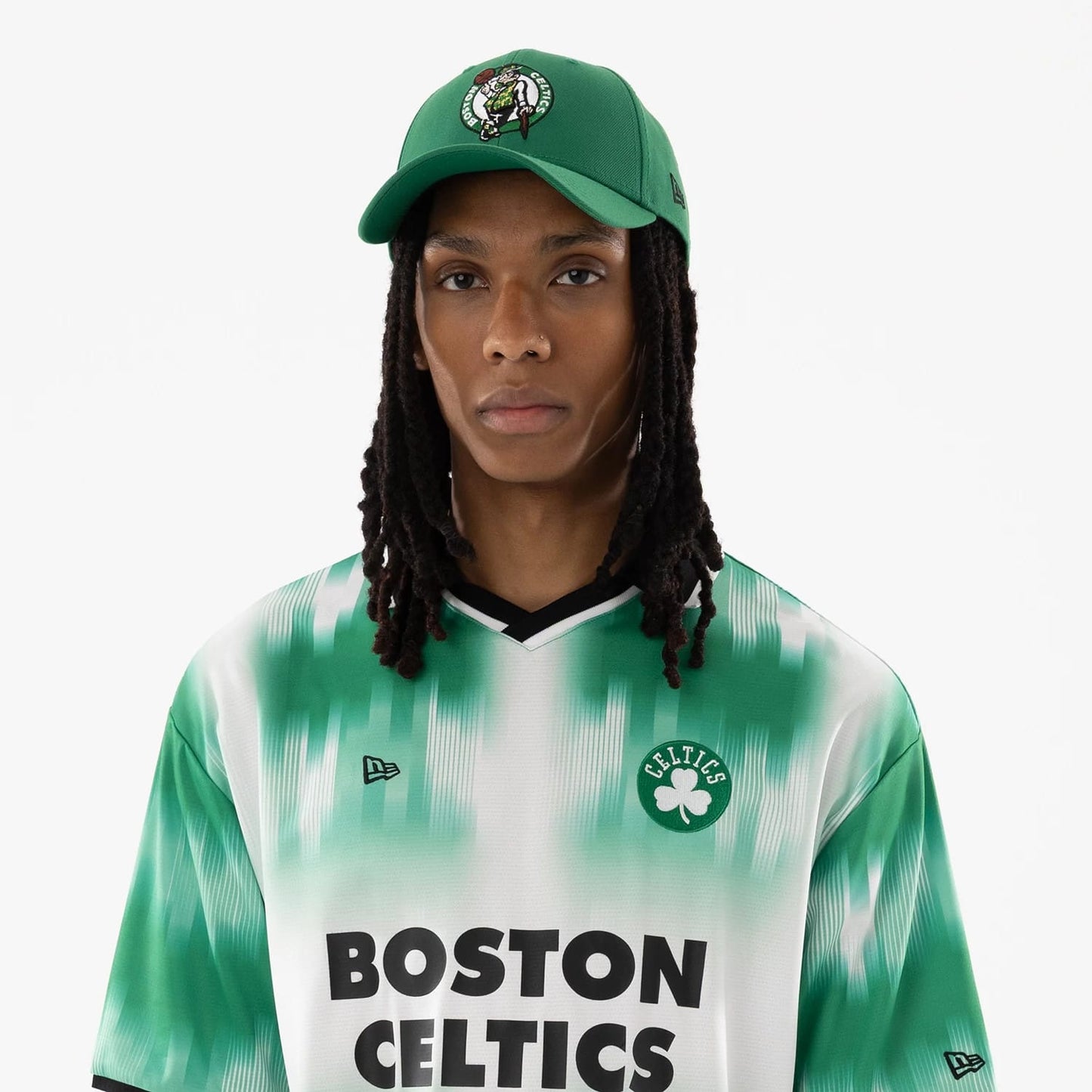 The model is wearing this NBA Boston Celtics Soccer Jersey in green. 6